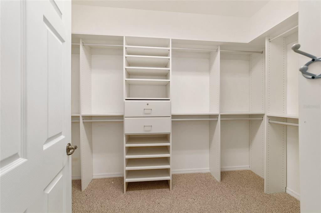 8434 Southwest 82nd Loop Ocala, FL 34481 - Photo 29 of 41 a view of walk in closet with empty racks