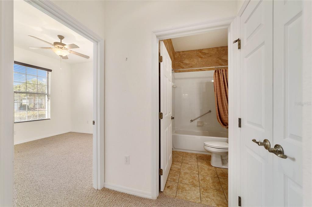 8434 Southwest 82nd Loop Ocala, FL 34481 - Photo 30 of 41 view of a bathroom with a glass door shower and a sink