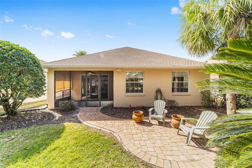 8434 Southwest 82nd Loop Ocala, FL 34481 - Photo 37 of 41 a view of a house with backyard and sitting area