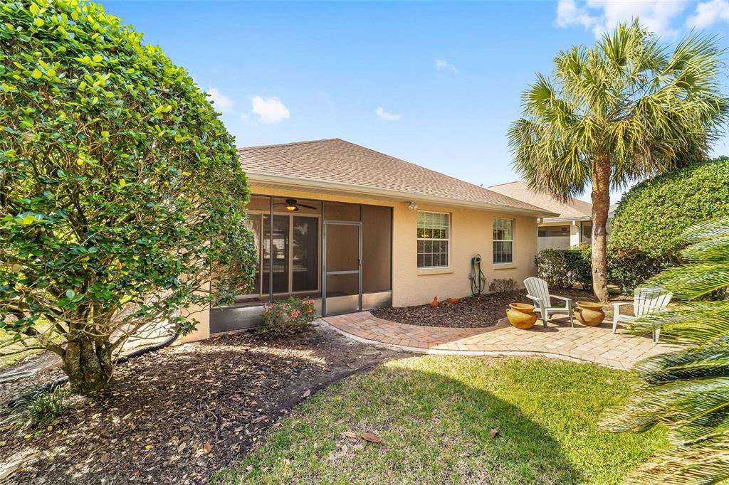 8434 Southwest 82nd Loop Ocala, FL 34481 - Photo 38 of 41 a view of a backyard with sitting area and porch
