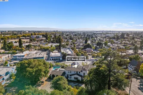 a view of a street from a balcony