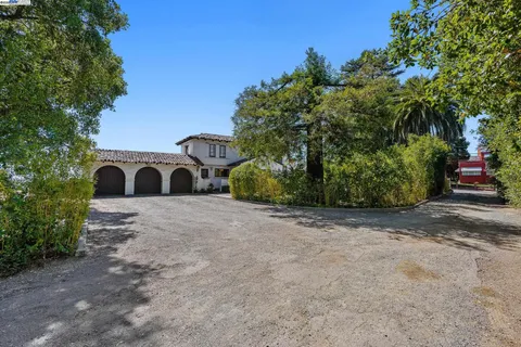a view of a front view of a house with garden