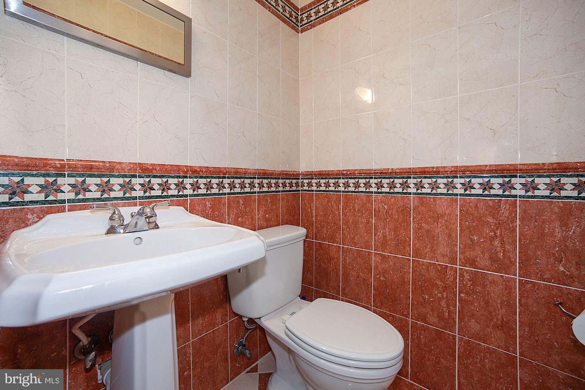 3241 Sutton Place Northwest, Unit B Washington, DC 20016 - Photo 16 of 35 Powder Room