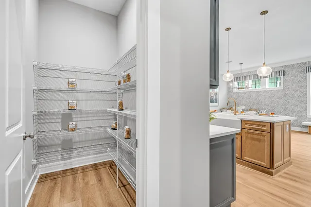a view of kitchen with wooden floor