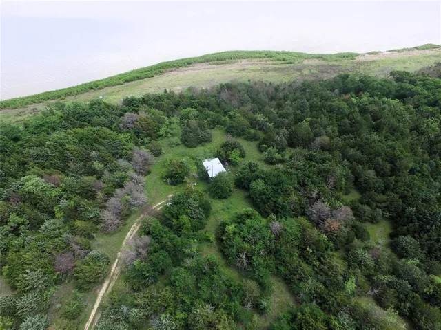 a view of an ocean with beach