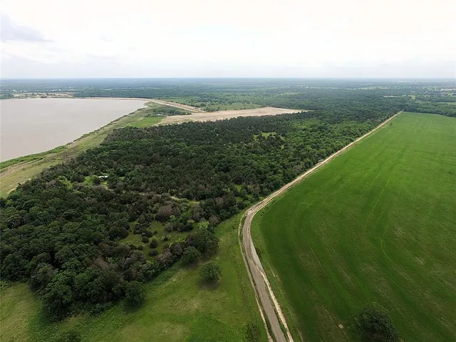 a view of a city from a lake view