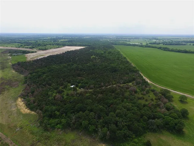 a view of city and mountain with lake view
