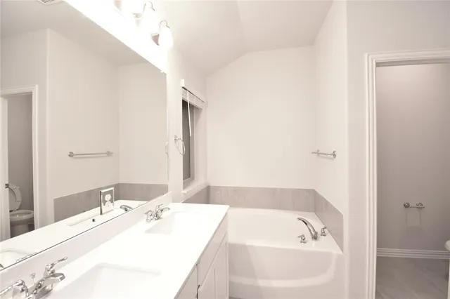 a bathroom with a sink and a bathtub