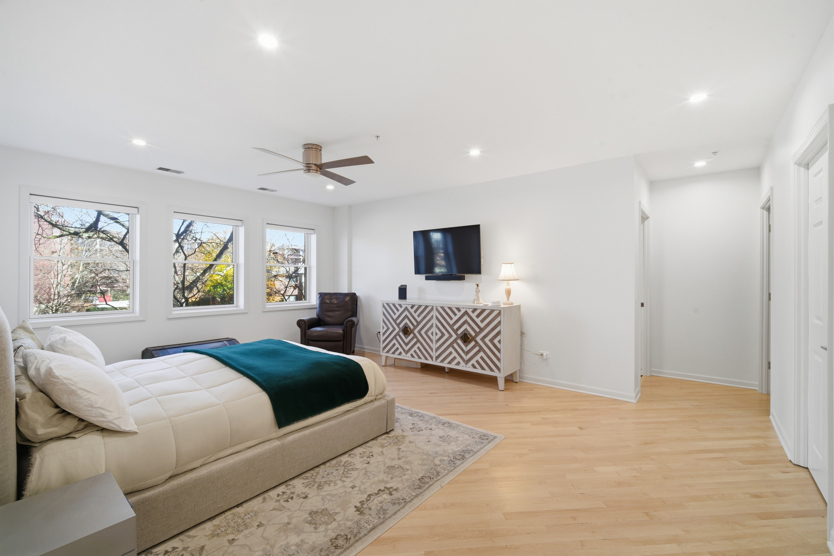 1688 Green Bay Road, Unit 204 Highland Park, IL 60035 - Photo 12 of 14 a spacious bedroom with a bed and a couch