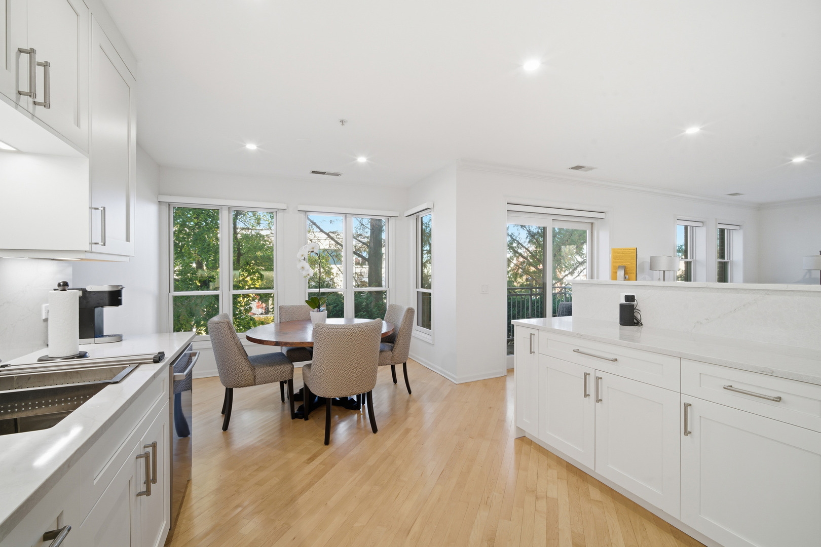 1688 Green Bay Road, Unit 204 Highland Park, IL 60035 - Photo 3 of 14 a living room with furniture and a large window