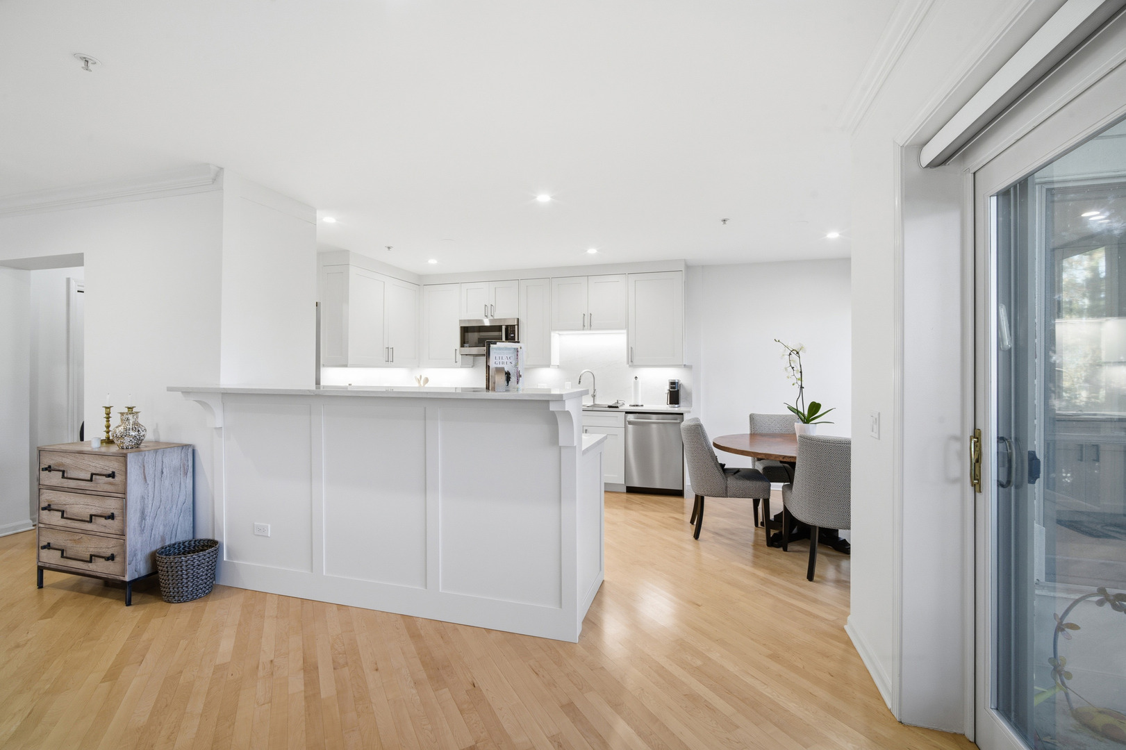 1688 Green Bay Road, Unit 204 Highland Park, IL 60035 - Photo 4 of 14 a view of kitchen with sink and wooden floor
