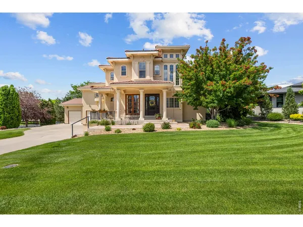 a view of a house with a big yard