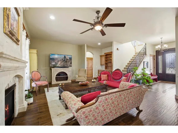 a view of a livingroom with furniture and a table