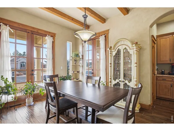 a view of living room with furniture and floor to ceiling windows