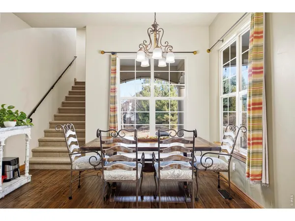a open kitchen with stainless steel appliances granite countertop a stove and cabinets