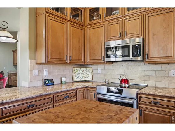 a bathroom with a toilet a sink and a mirror