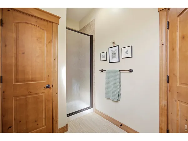 a bedroom with a bed dresser and a window