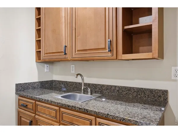 a view of a backyard with sitting area