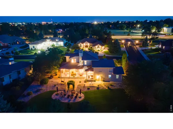 a house view with a sitting space and garden view