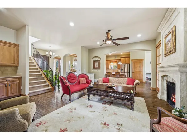 a living room with furniture or couch and a fireplace