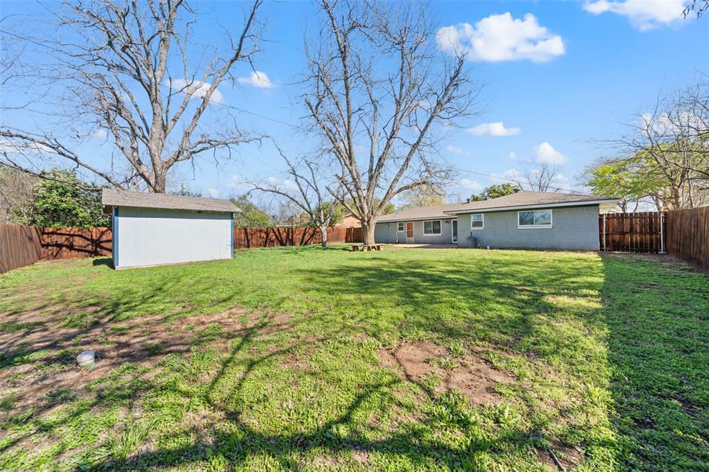 104 East Santa Anna Street Robinson, TX 76706 - Photo 35 of 36 a view of a house with yard and tree s