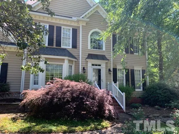 a view of a house with a garden