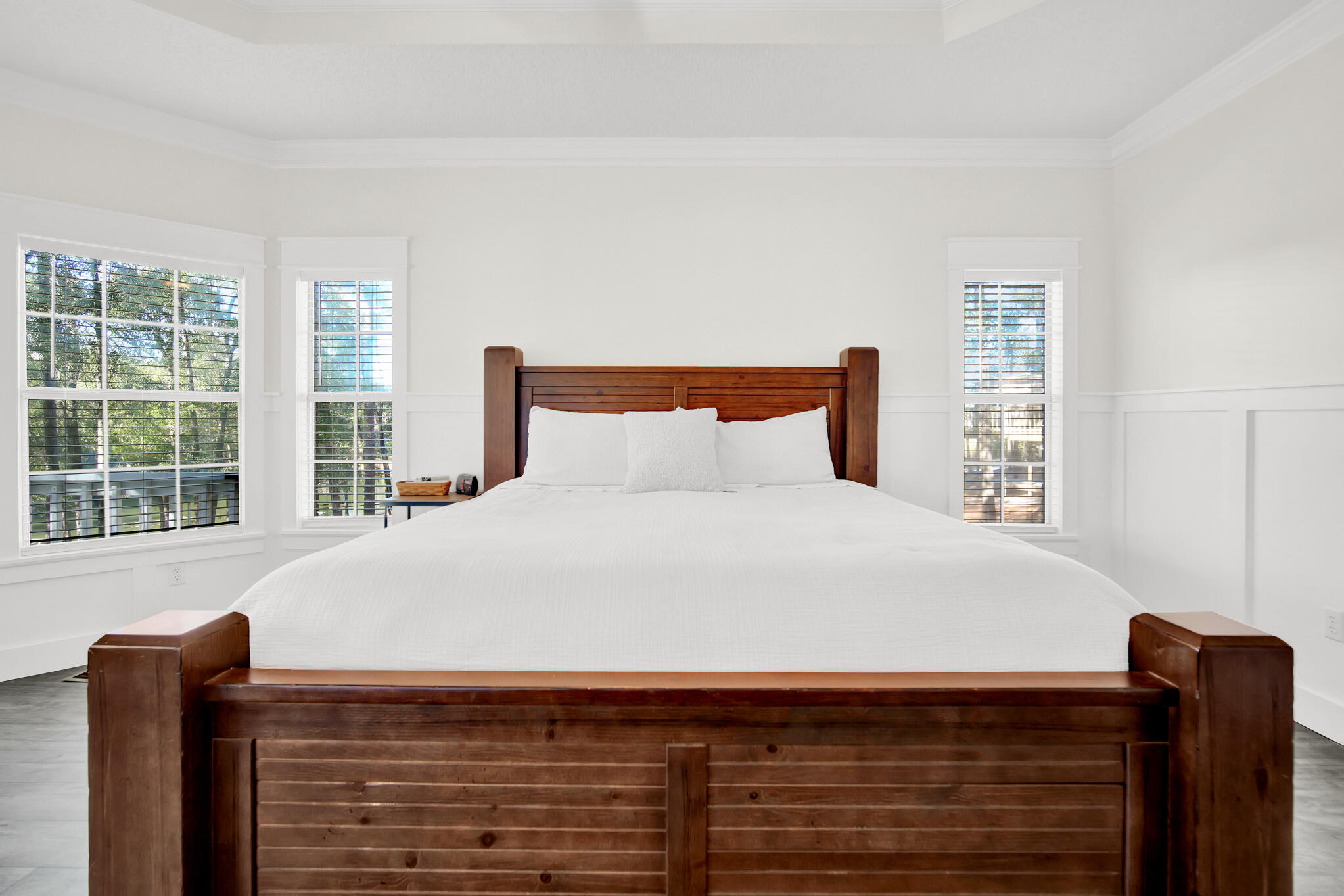 115 Steves Place Crestview, FL 32536 - Photo 24 of 66 a bedroom with a bed and wooden floor