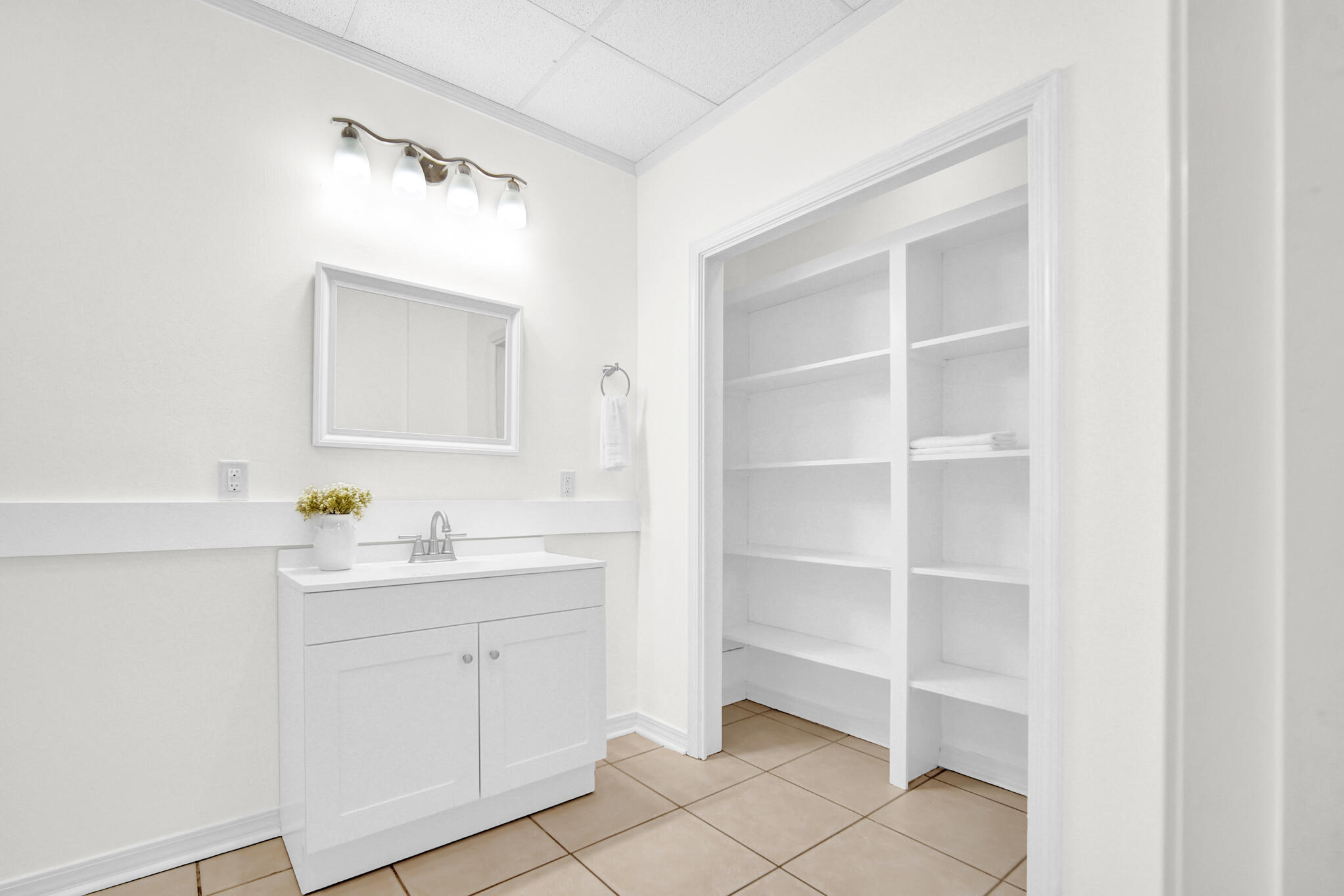 115 Steves Place Crestview, FL 32536 - Photo 46 of 66 a view of cabinets with wooden floor