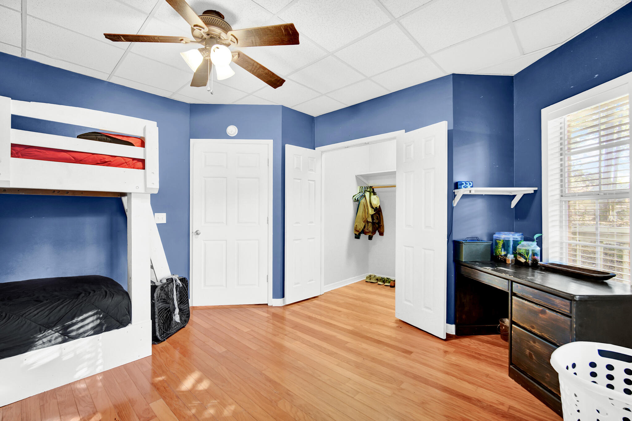 115 Steves Place Crestview, FL 32536 - Photo 52 of 66 a bedroom with a bed dresser and a window