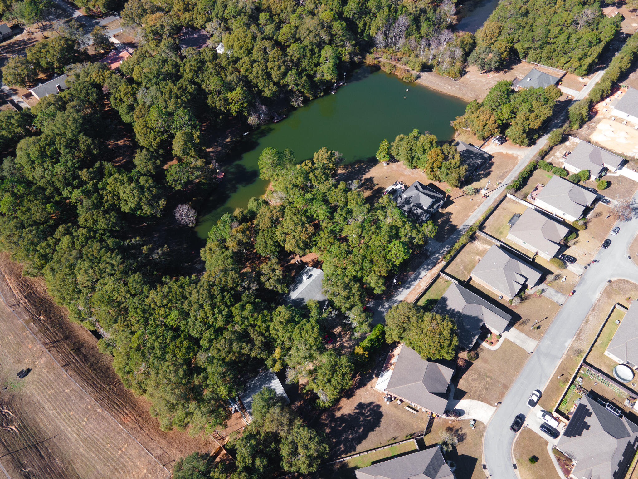 115 Steves Place Crestview, FL 32536 - Photo 63 of 66 an aerial view of a house with a yard