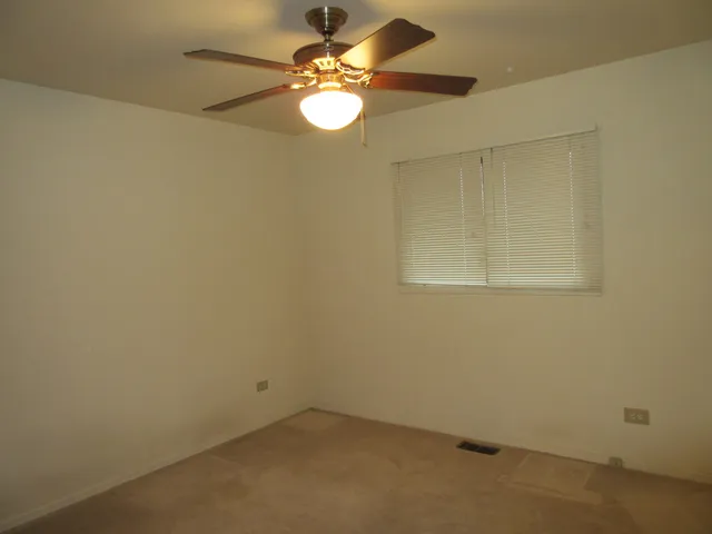 a bathroom with a shower and a door