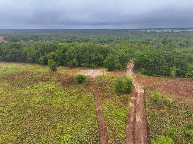 a view of a lake with a yard