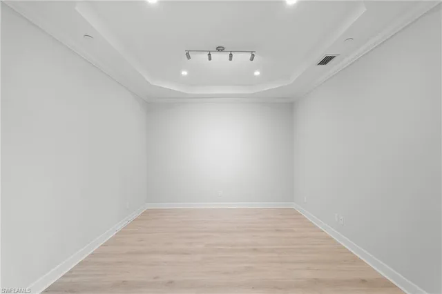 a view of a big room with balcony and furniture