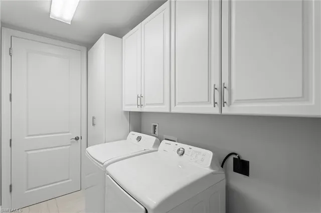 a bathroom with a sink vanity mirror and toilet