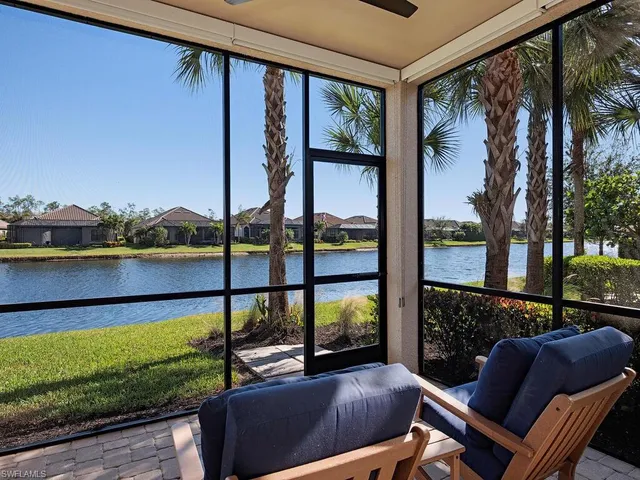 a view of a chairs and table in the patio
