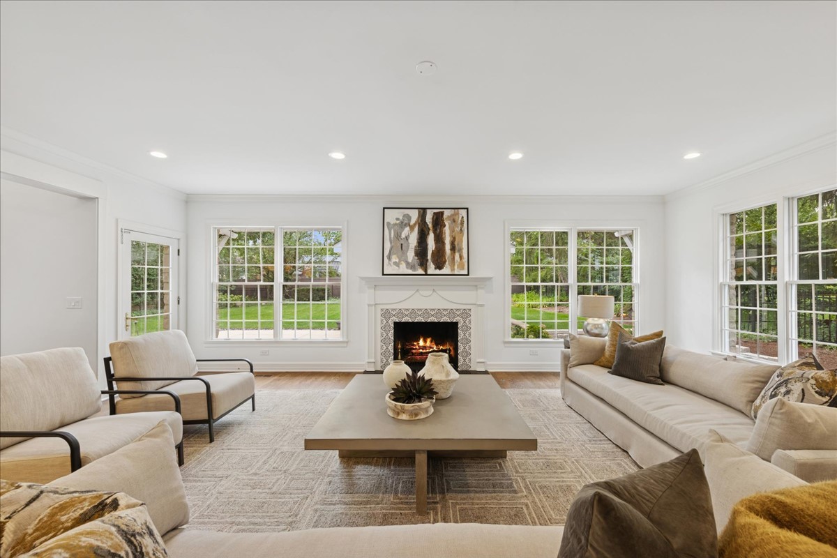 628 South County Line Road Hinsdale, IL 60521 - Photo 13 of 34 a living room with furniture large window and fireplace