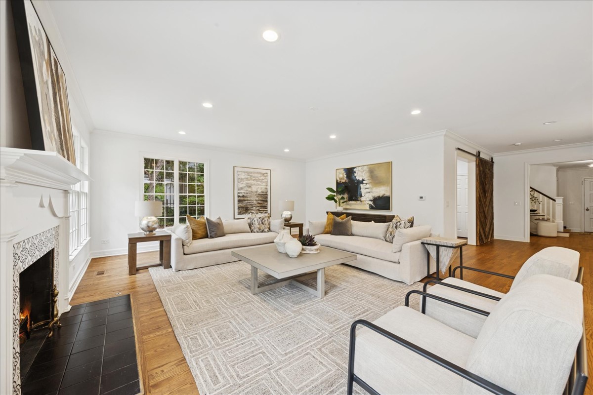 628 South County Line Road Hinsdale, IL 60521 - Photo 14 of 34 a living room with furniture and a fireplace
