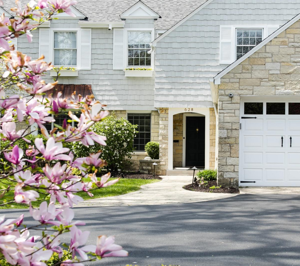 628 South County Line Road Hinsdale, IL 60521 - Photo 3 of 34 a front view of a house with yard
