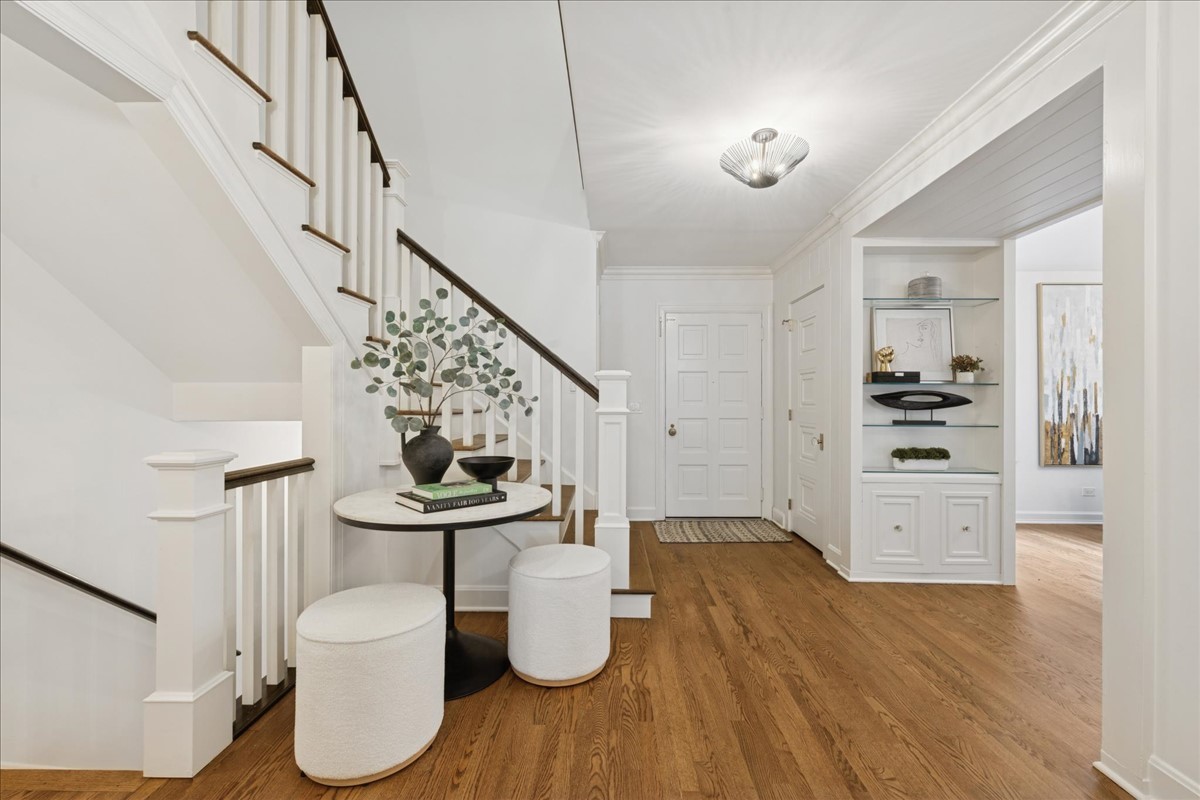 628 South County Line Road Hinsdale, IL 60521 - Photo 4 of 34 a view of kitchen with furniture and wooden floor