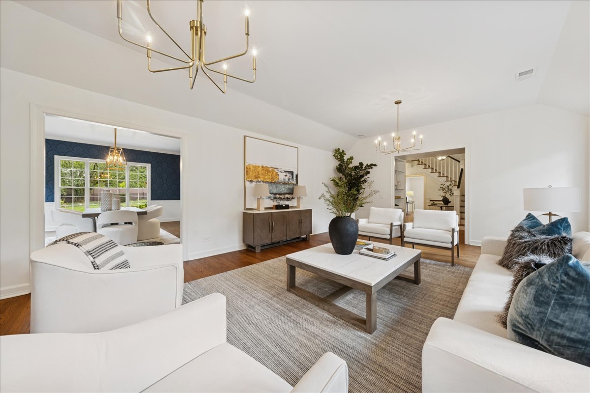 628 South County Line Road Hinsdale, IL 60521 - Photo 7 of 34 a living room with furniture and a wooden floor