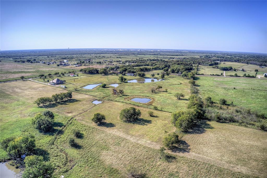 Lot 2 County Road 236 Terrell, TX 75160 - Photo 12 of 18 an aerial view of a houses with a yard