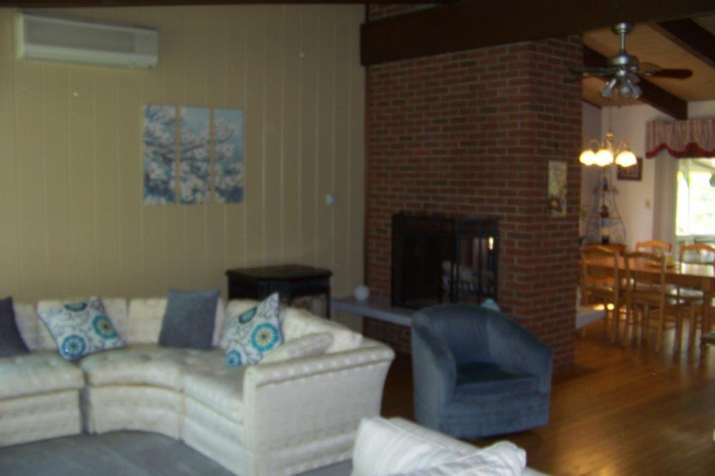 5 Green Street Springvale, ME 04083 - Photo 10 of 34 Living room w/ wood burning...
