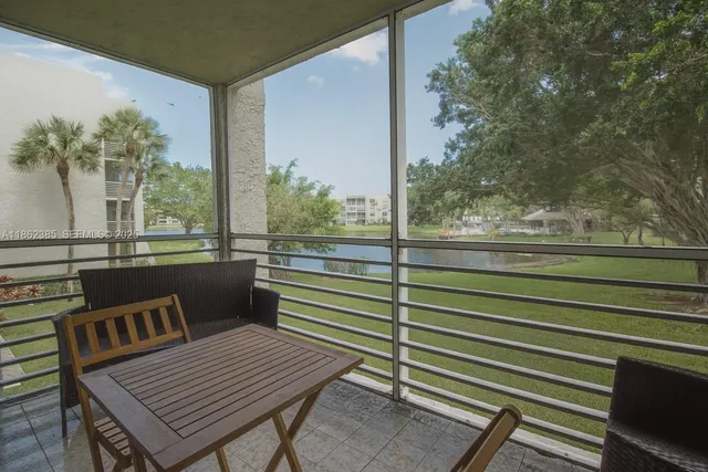 a view of a outdoor seating area with furniture
