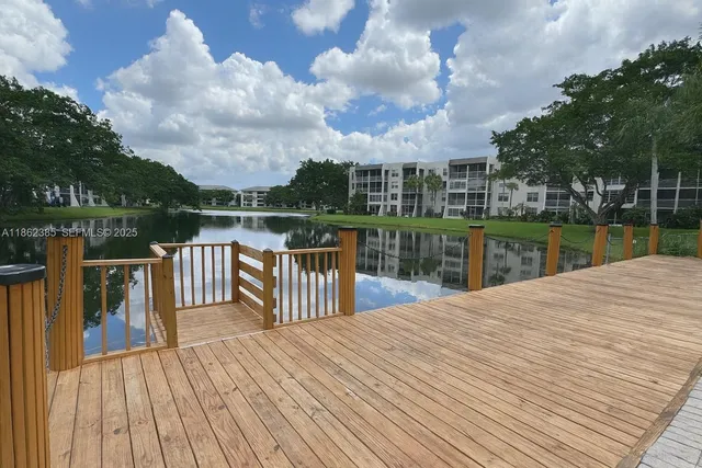 a view of a lake with a deck