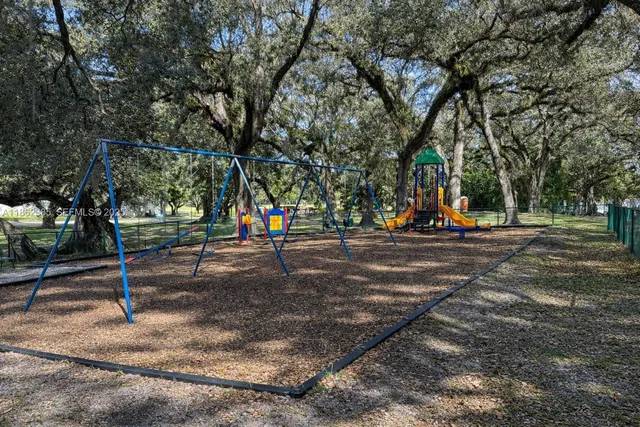 a view of a park with swings