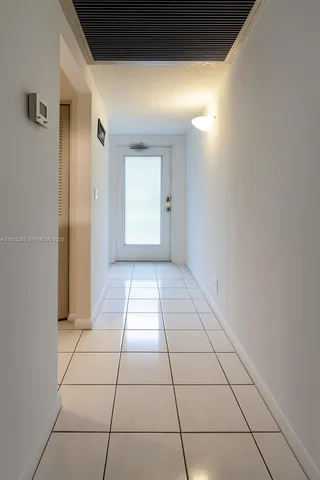 a view of a hallway with interior of a house