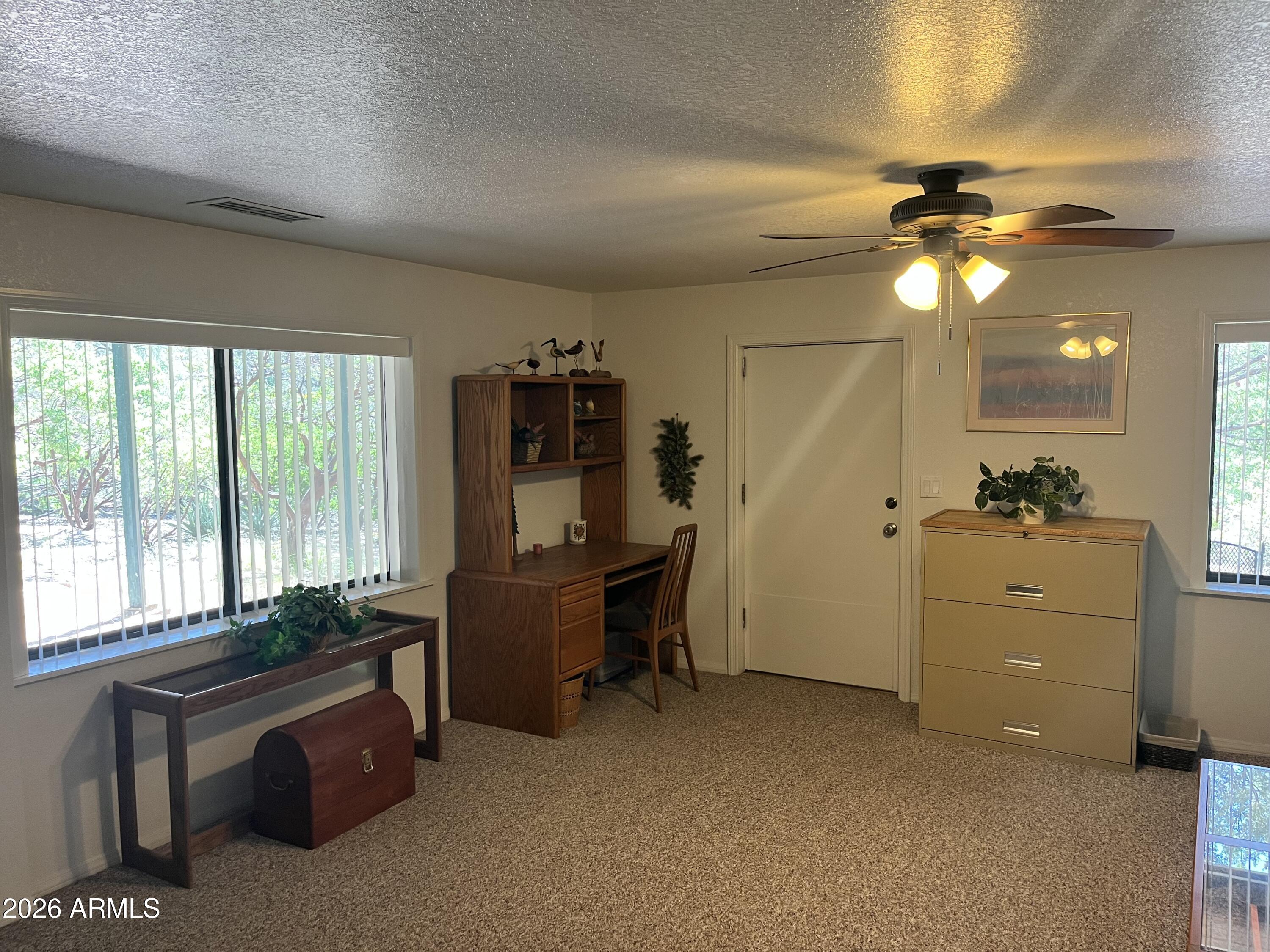 1006 North Matterhorn Road Payson, AZ 85541 - Photo 21 of 37 a room with window and ceiling fan