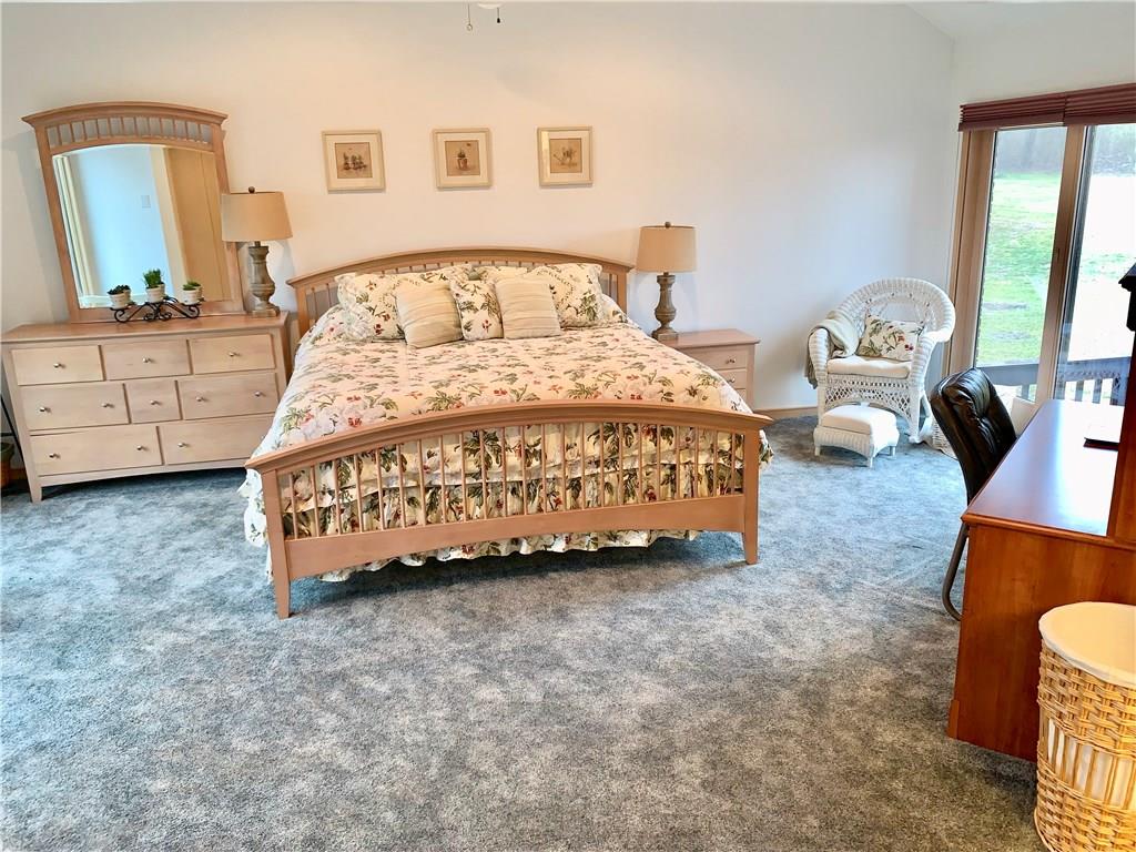 3450 Pinewood Road Irwin, PA 15642 - Photo 15 of 25 main level bedroom perfect for guests or those wanting a main level master. full bath attaches to office. Sliders to deck.