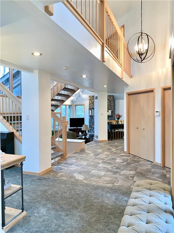 3450 Pinewood Road Irwin, PA 15642 - Photo 3 of 25 spectacular open entryway w/ceramic tile and modern chandelier allows perfect view of the entire main floor when you walk in the door!