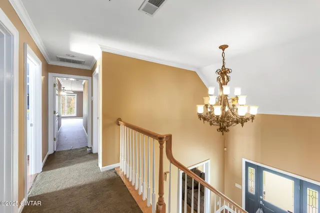 a view of a livingroom from a hallway